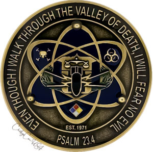 Gold-tone challenge coin. Features Westchester County EOD emblem, scales,