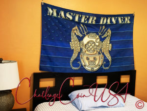 Blue 3x5 flag with gold "Master Diver" text and nautical design. Features a diver helmet, rope, and sea creatures. Challenge