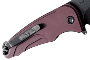 Red Medford Knife Smooth Criminal. Visible hardware and handle detail. Challenge Coin USA branding.
