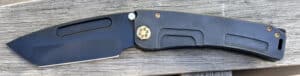 Black Medford Marauder-H knife. Partially open, showing blade. Features a