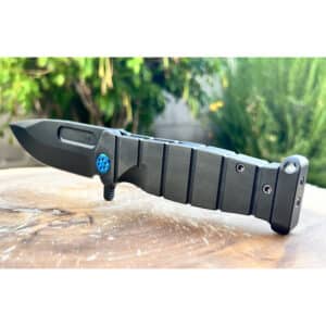 Black Medford USMC Fighter flipper knife. Visible hardware and textured
