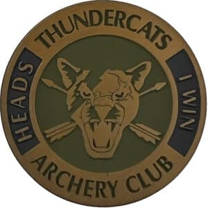 Bronze challenge coin. Features a snarling tiger head design
