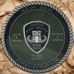 Challenge coin. Silver and green. Features Knox County Sheriff's Office